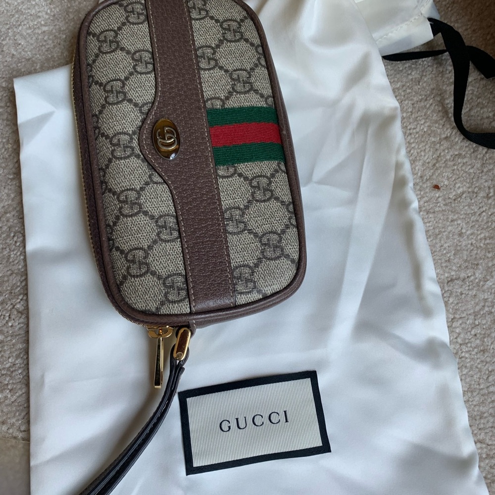 Gucci wristlet, fits a big cell phone